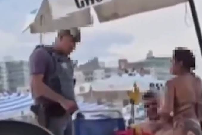 Casal têm momento ‘quente’ em praia interrompido por policial