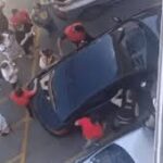 Policial quebra vidro de carro para resgatar bebê