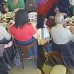 Mulher rouba bolsa de cliente em restaurante e sai sorrateiramente do local