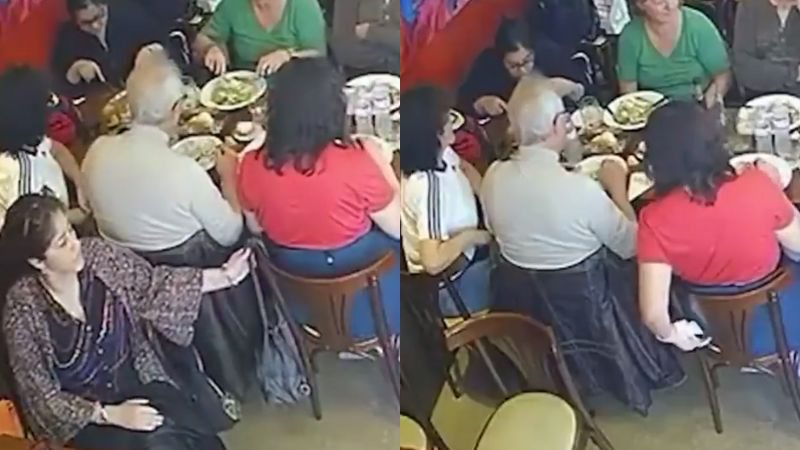 Mulher rouba bolsa de cliente em restaurante e sai sorrateiramente do local
