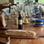 Imagens mostram almoço VIP com caviar e vinhos finos organizado por Daniel Vorcaro para o ministro Alexandre de Moraes